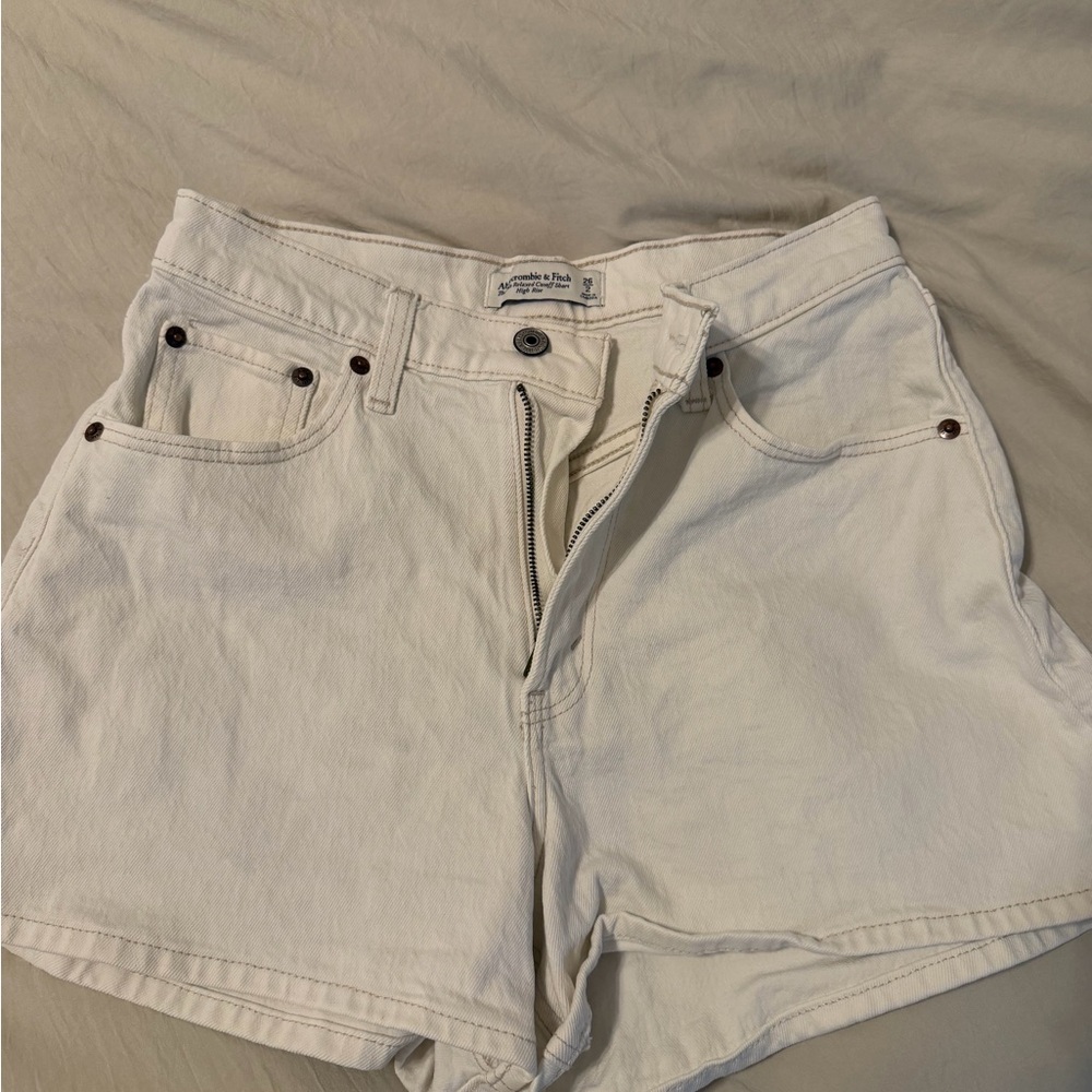 Abercrombie & Fitch Women's White the 90s relaxed cutoff shorts.